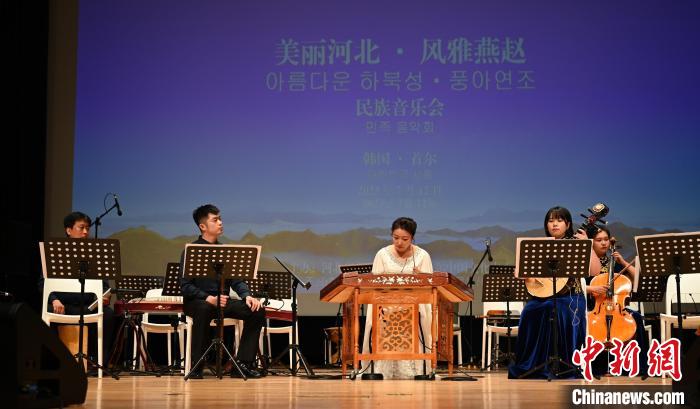 圖為音樂會現(xiàn)場?！∈谞栔袊幕行墓﹫D