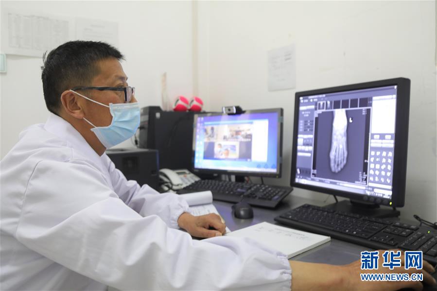 （圖文互動(dòng)）（3）隔屏看專家 “醫(yī)共體”緩解看病難