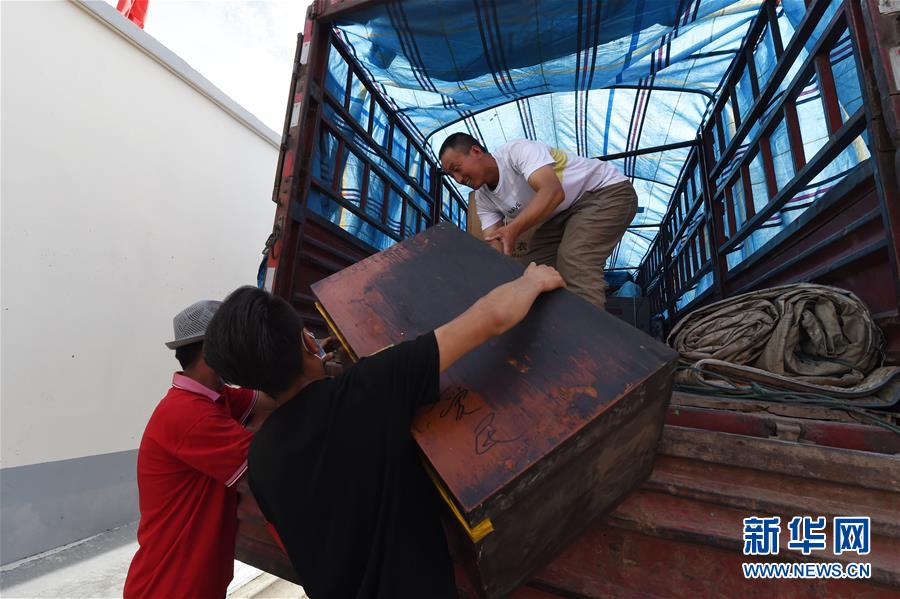 （新華全媒+）（26）千里“挪窩”，踏實(shí)開(kāi)啟新生活