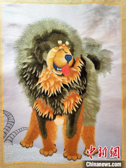 圖為藏繡作品?！∑钤鲚?攝